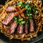 garlic butter steak lightning noodles recipe in bowl